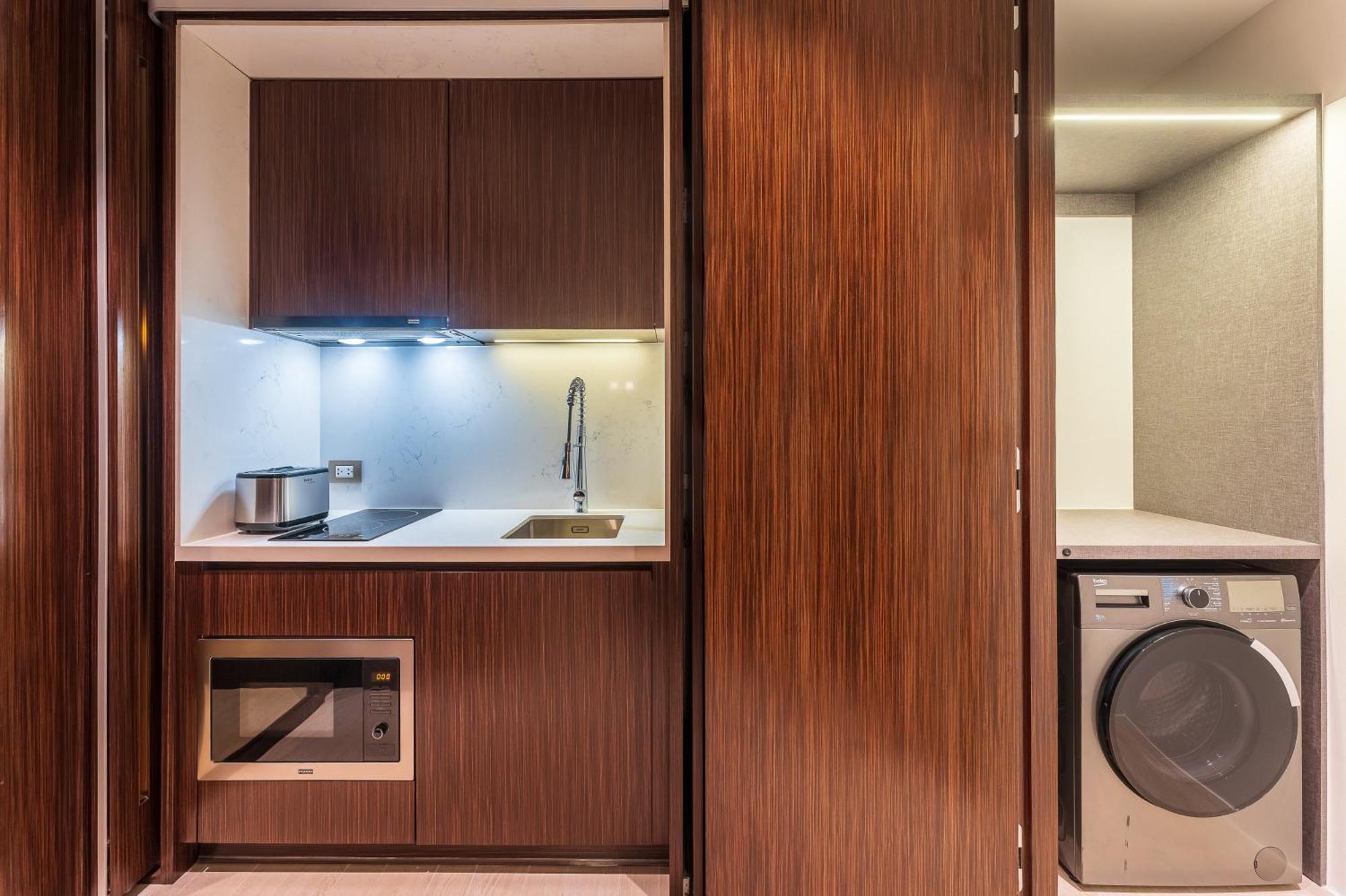Silq Hotel & Residence, Managed By The Ascott Limited Bangkok Room photo A kitchen in a serviced apartment